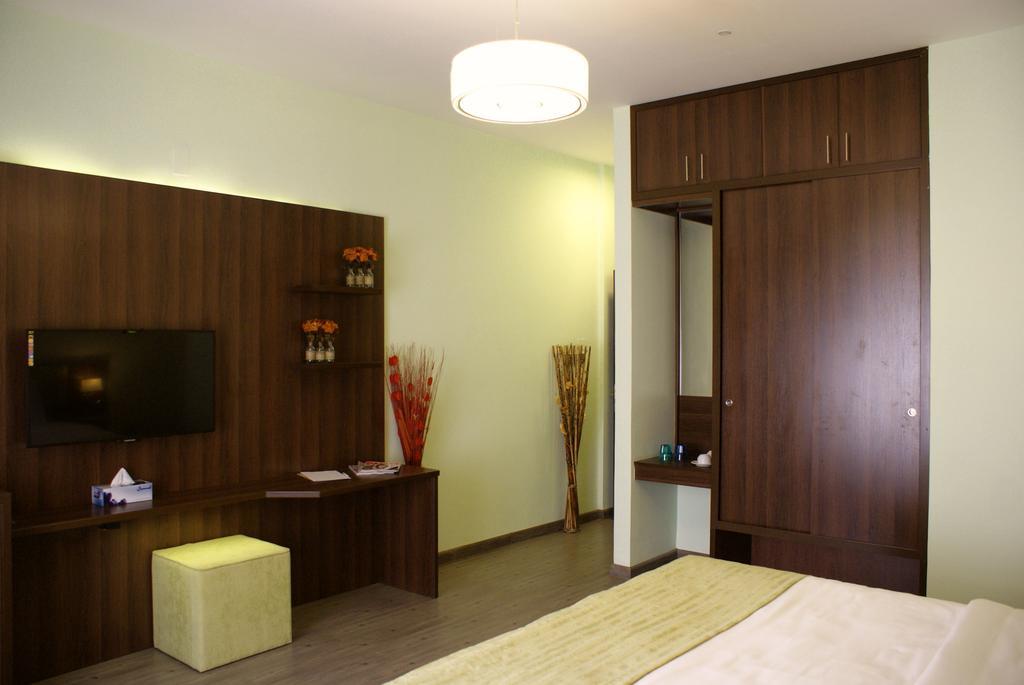 Weekend Hotel & Apartments Mascate Quarto foto