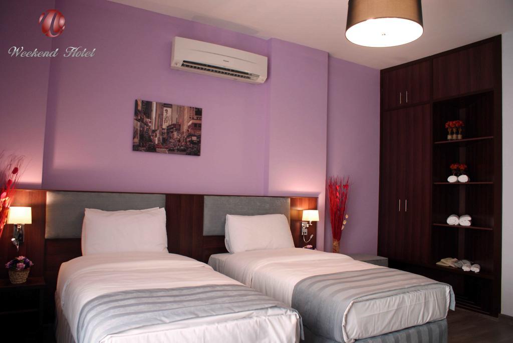 Weekend Hotel & Apartments Mascate Quarto foto